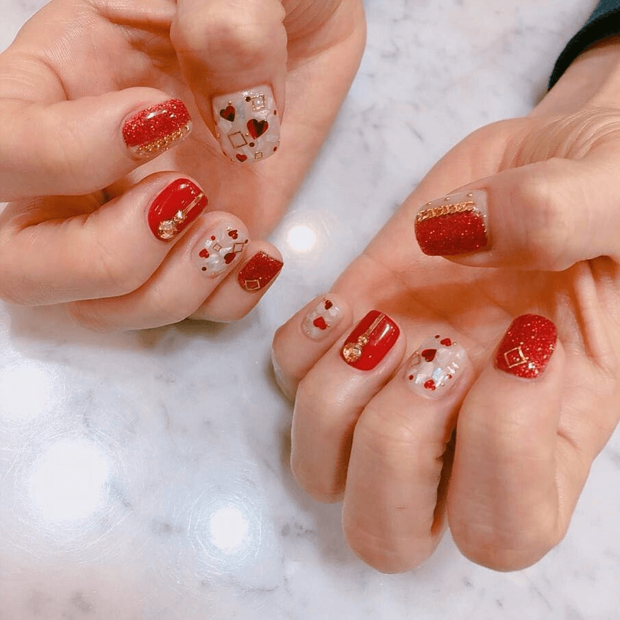 Mẫu nail tết tone màu đỏ