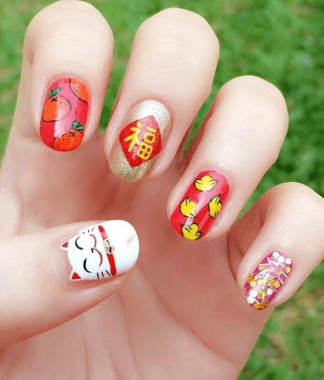 Mẫu nail tết vẽ mèo thần tài