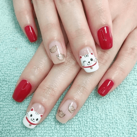 Mẫu nail tết vẽ mèo thần tài